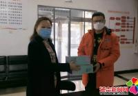 駐街單位送來口罩 助力社區防控疫情