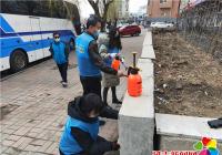 “藍馬甲”志愿者在行動 美化環境助力創城
